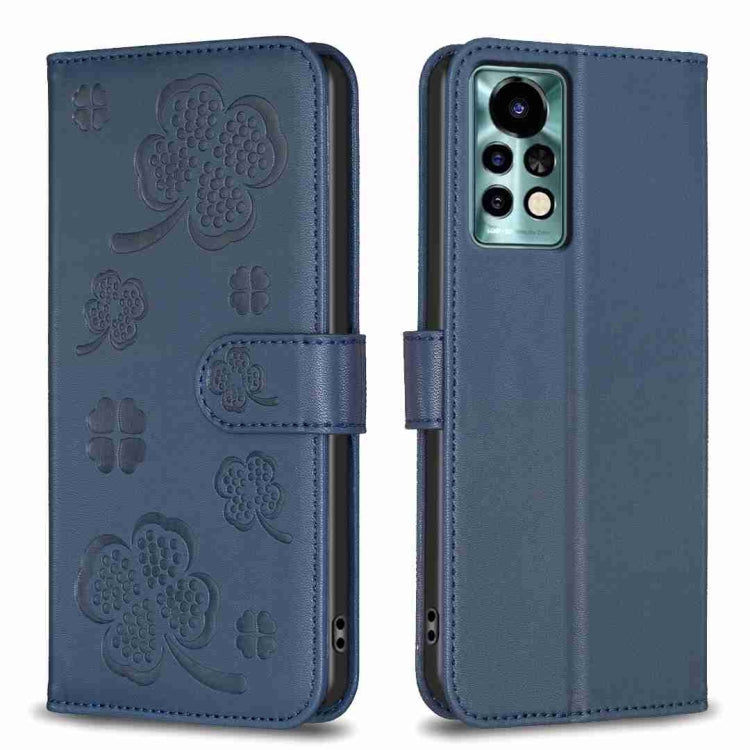 Blue four-leaf embossed leather phone case, folio strap, camera cutout.
