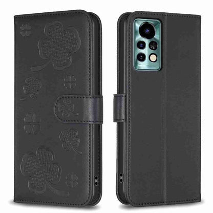 Black four-leaf embossed leather phone case, folio strap, camera cutout.