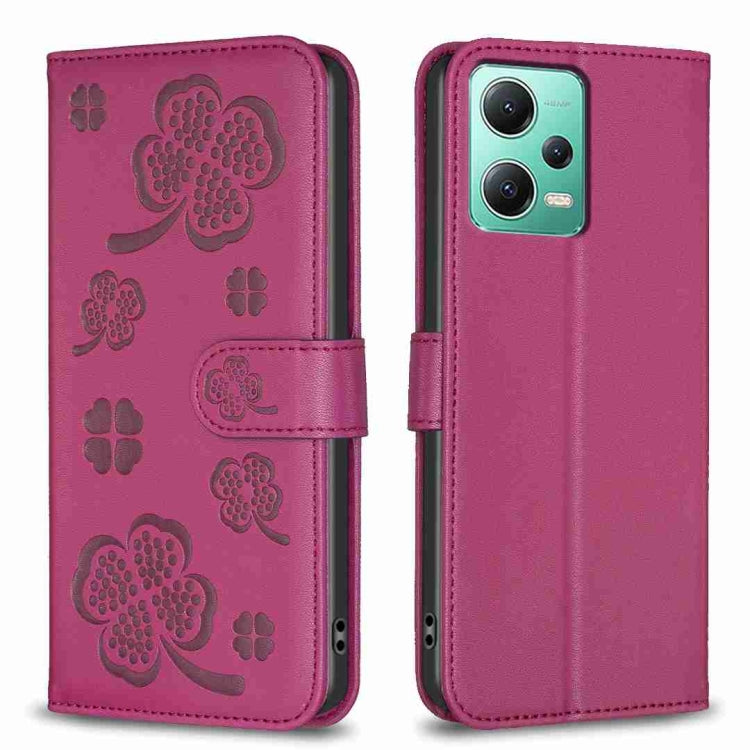 Rose red embossed leather-style phone case with four-leaf clover pattern and folio flap