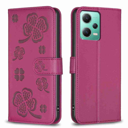 Rose red embossed leather-style phone case with four-leaf clover pattern and folio flap