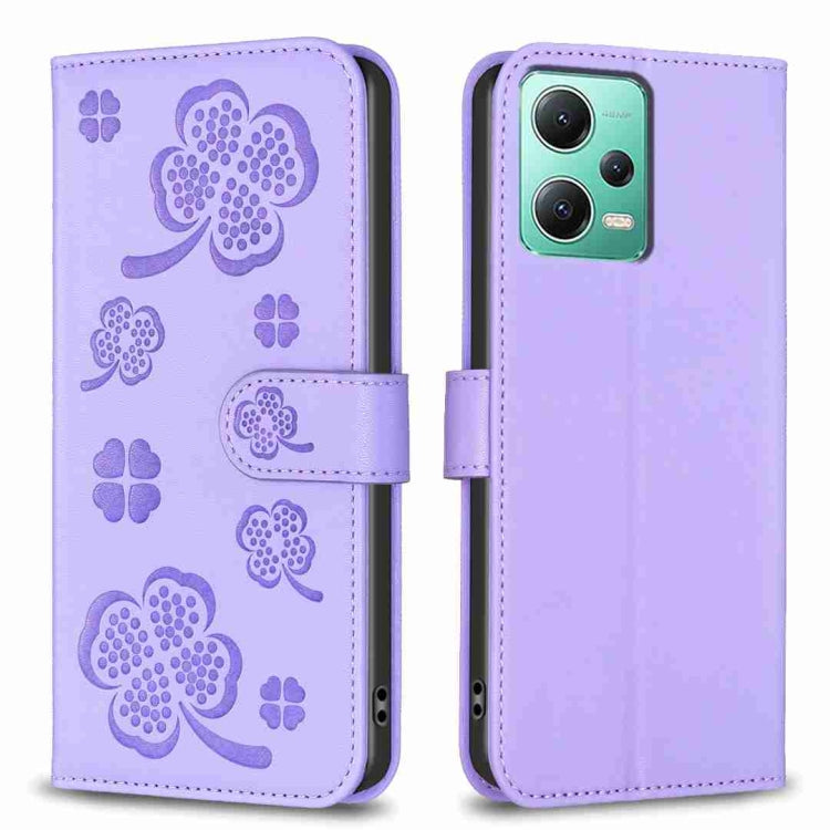 Lavender embossed leather-style phone case with four-leaf clover pattern and folio flap