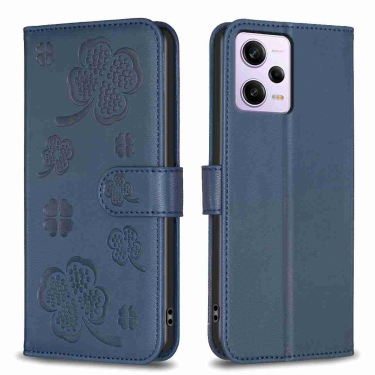 Blue embossed floral four-leaf clover leather phone case with flip cover