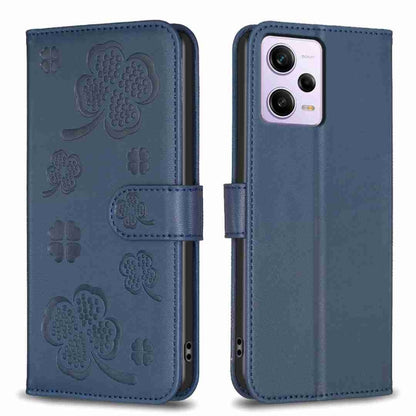 Blue embossed floral four-leaf clover leather phone case with flip cover