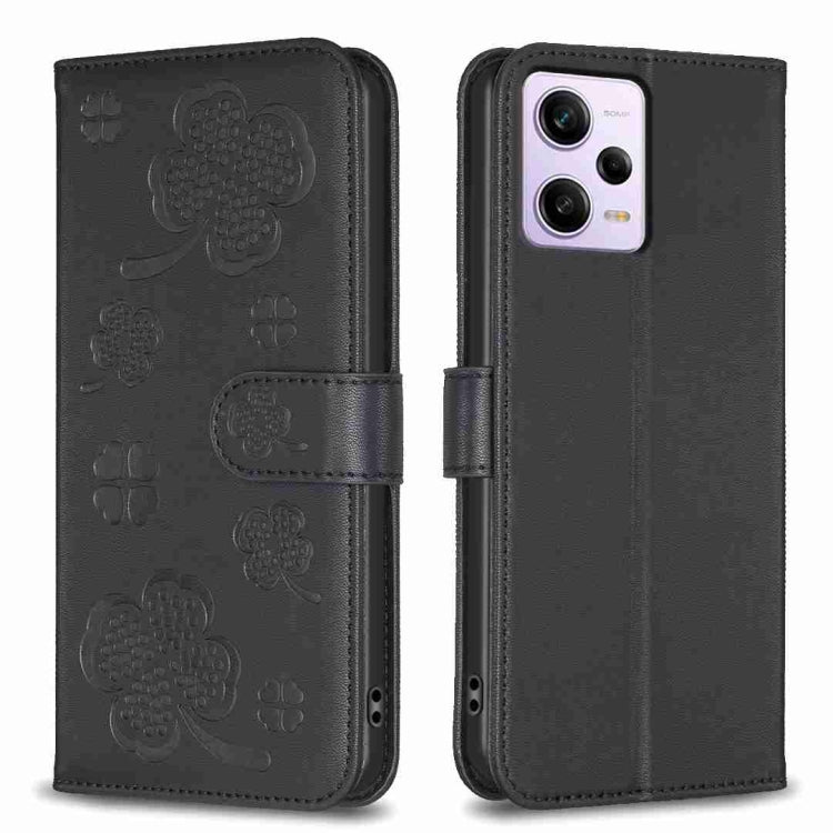 Black embossed floral four-leaf clover leather phone case with flip cover