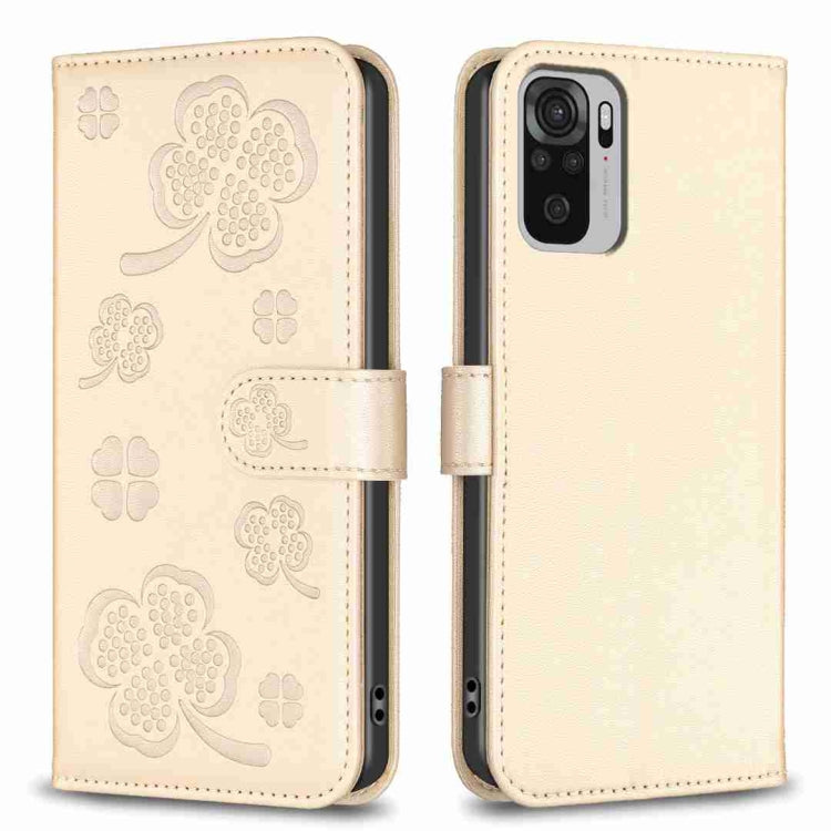 Beige embossed four-leaf clover leather wallet phone case with magnetic flap.