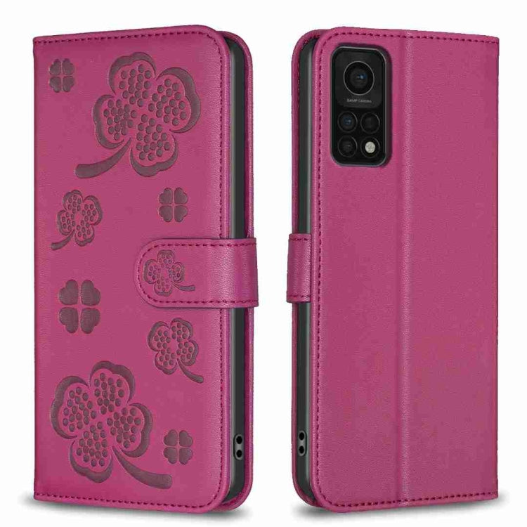 Purple four-leaf embossed leather phone case with wallet flap and magnetic strap