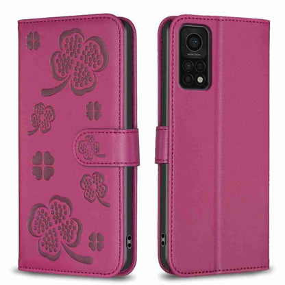 Purple four-leaf embossed leather phone case with wallet flap and magnetic strap
