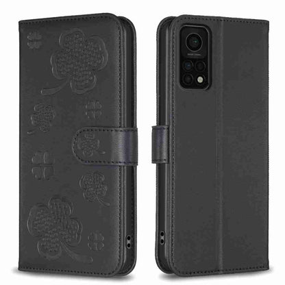 Black four-leaf embossed leather phone case with wallet flap and magnetic strap