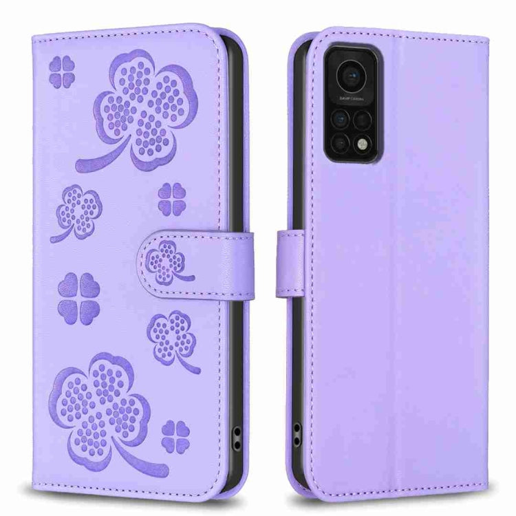 Lavender four-leaf embossed leather phone case with wallet flap and magnetic strap