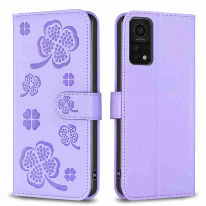 Lavender four-leaf embossed leather phone case with wallet flap and magnetic strap
