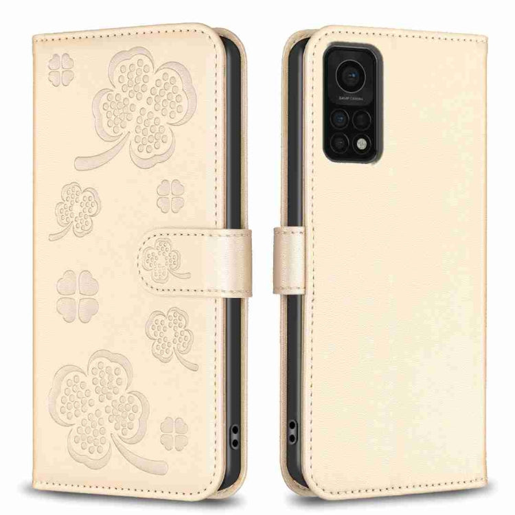 Beige four-leaf embossed leather phone case with wallet flap and magnetic strap