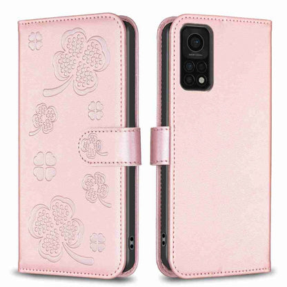 Rose-pink four-leaf embossed leather phone case with wallet flap and magnetic strap