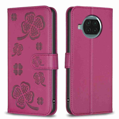 Magenta purple four-leaf embossed leather phone case with wallet flap and magnetic strap