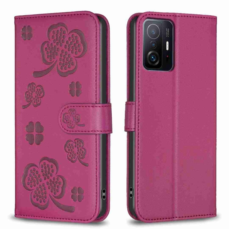 Rose-red embossed leather phone case with four-leaf clover pattern and folio flap