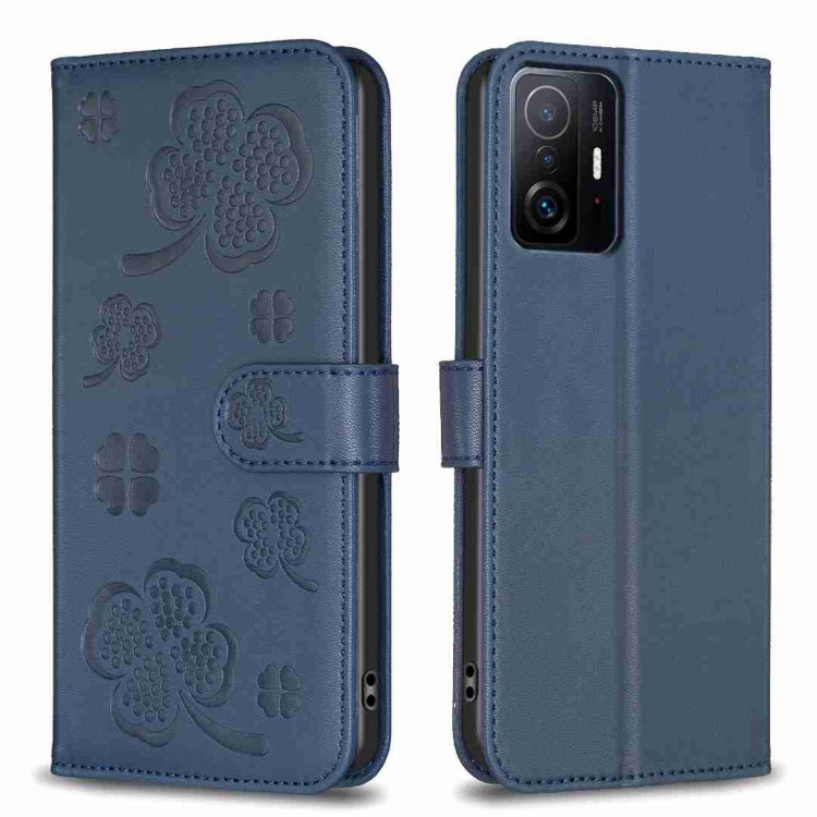 Blue embossed leather phone case with four-leaf clover pattern and folio flap