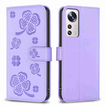 Four-leaf embossed leather phone case with folio strap, light purple
