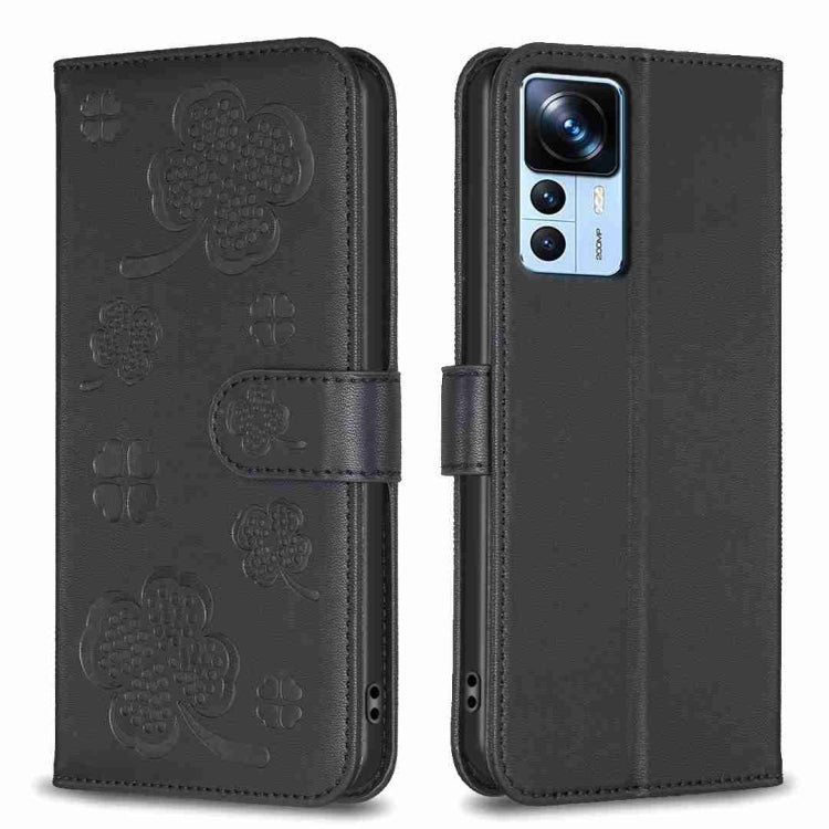 Four-leaf embossed leather phone case with folio strap, dark black