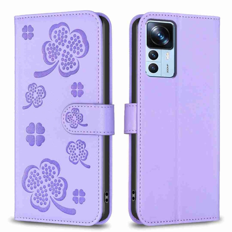 Four-leaf embossed leather phone case with folio strap, light purple