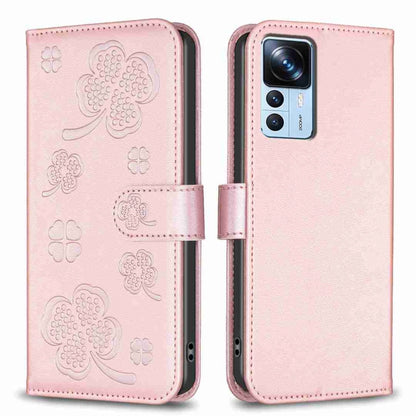 Four-leaf embossed leather phone case with folio strap, pale pink