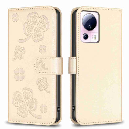 Beige four-leaf embossed leather phone case with flip cover and clover pattern
