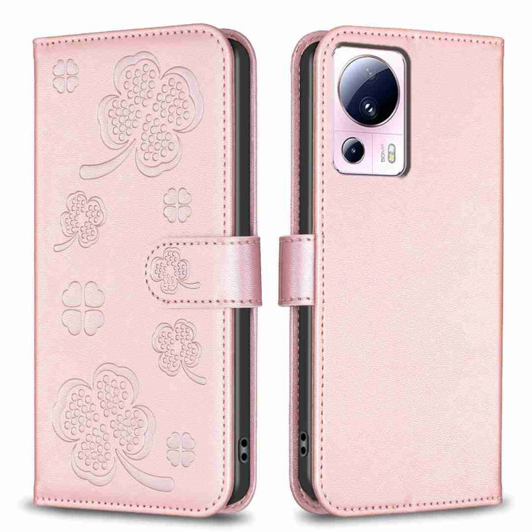 Pink four-leaf embossed leather phone case with flip cover and clover pattern