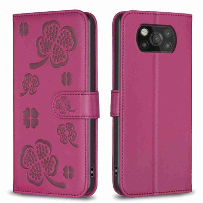 Four-leaf embossed leather phone case with flip strap, magenta purple