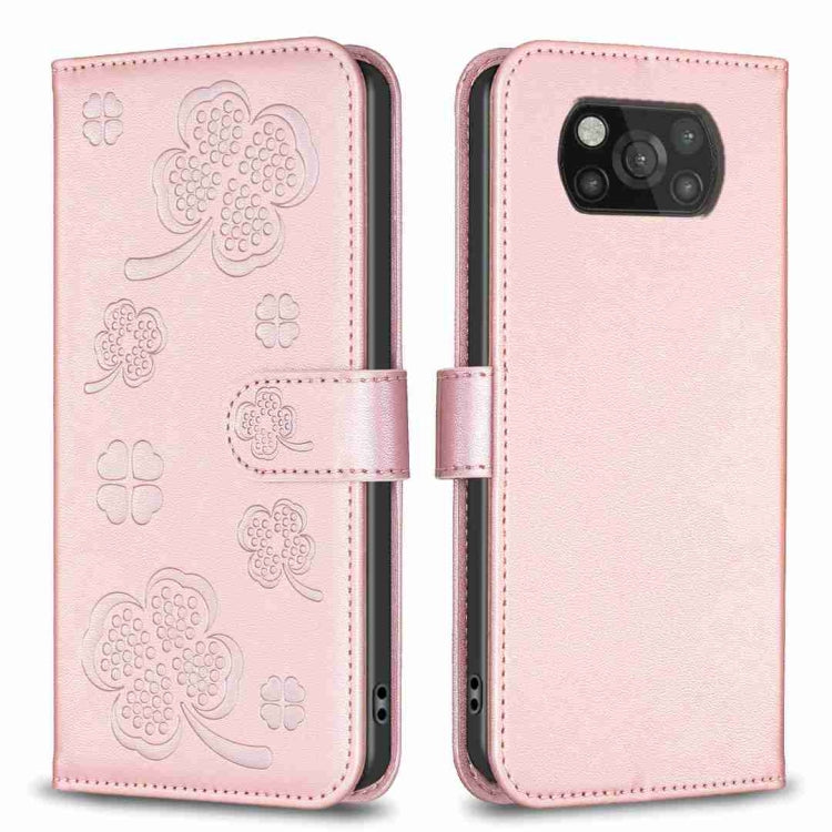 Four-leaf embossed leather phone case with flip strap, light pink