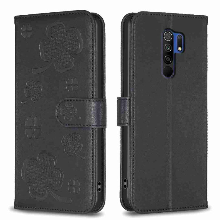 Four-leaf embossed leather phone case, black folio with card slot and multi-camera cutouts
