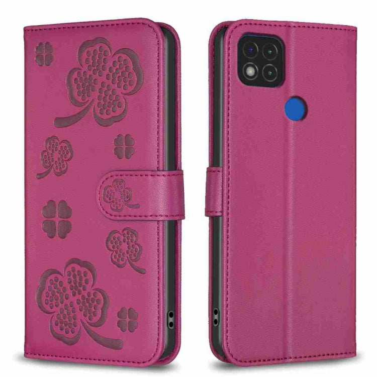 Embossed leather phone case with clover pattern and side flip strap, magenta