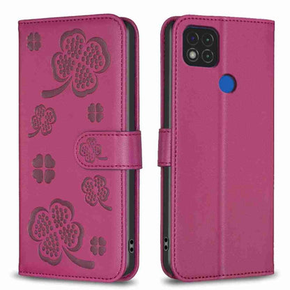 Embossed leather phone case with clover pattern and side flip strap, magenta