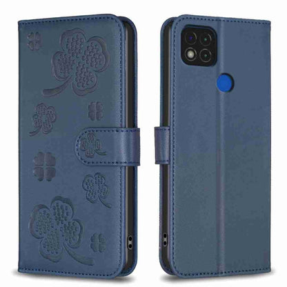 Embossed leather phone case with clover pattern and side flip strap, deep blue