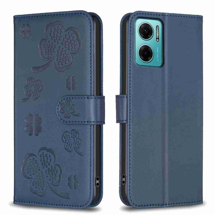 Embossed leather phone case with clover pattern and side flip strap, blue