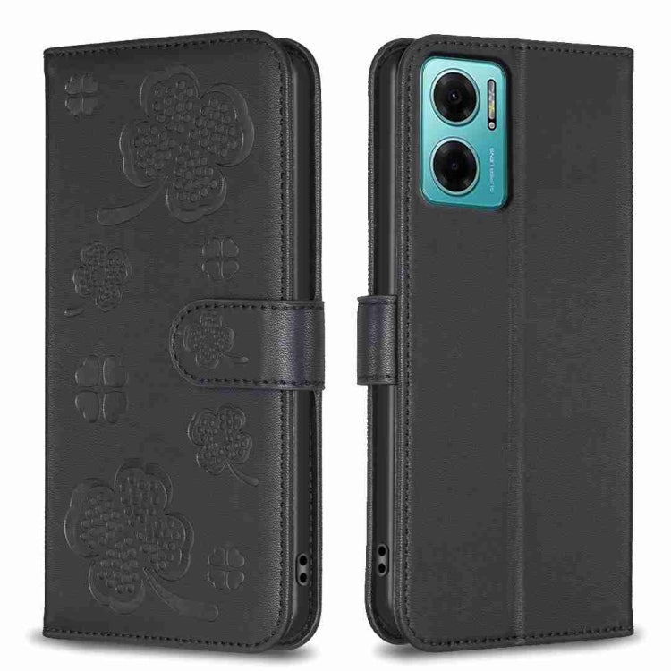 Embossed leather phone case with clover pattern and side flip strap, dark