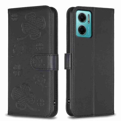 Embossed leather phone case with clover pattern and side flip strap, dark
