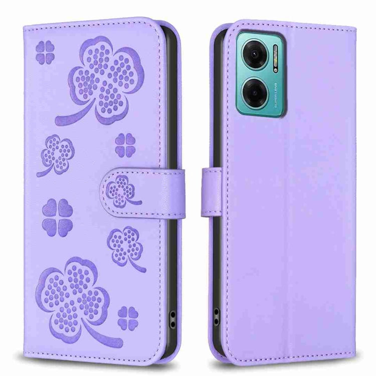 Embossed leather phone case with clover pattern and side flip strap, light purple
