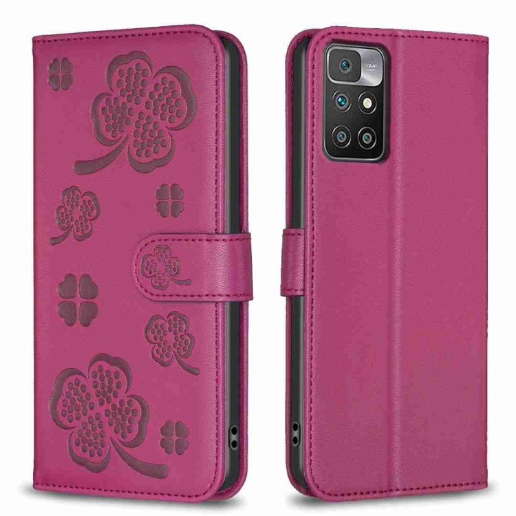 Magenta embossed leather phone case with four-leaf clover pattern and flip strap