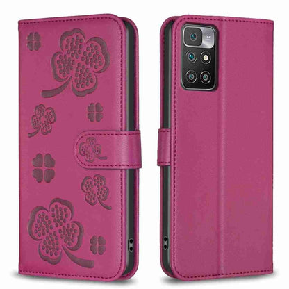 Magenta embossed leather phone case with four-leaf clover pattern and flip strap