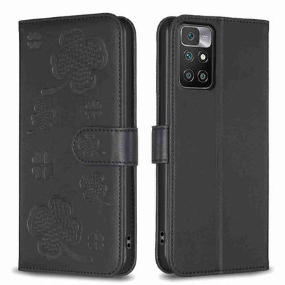Black embossed leather phone case with four-leaf clover pattern and camera cutout