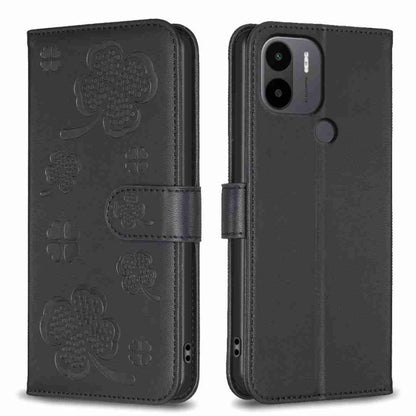 Black four-leaf embossed leather phone case with flip cover and side strap, camera cutout