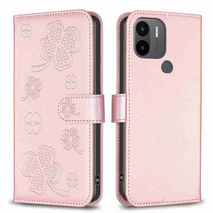 Pink four-leaf embossed leather phone case with flip cover and side strap, camera cutout