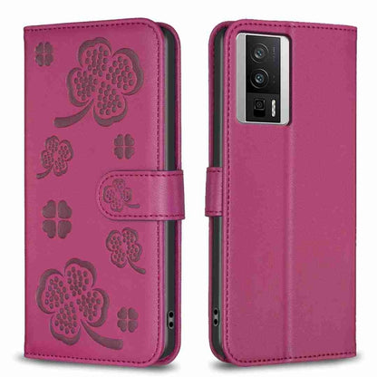 Purple four-leaf embossed leather phone case with flip cover and clover pattern