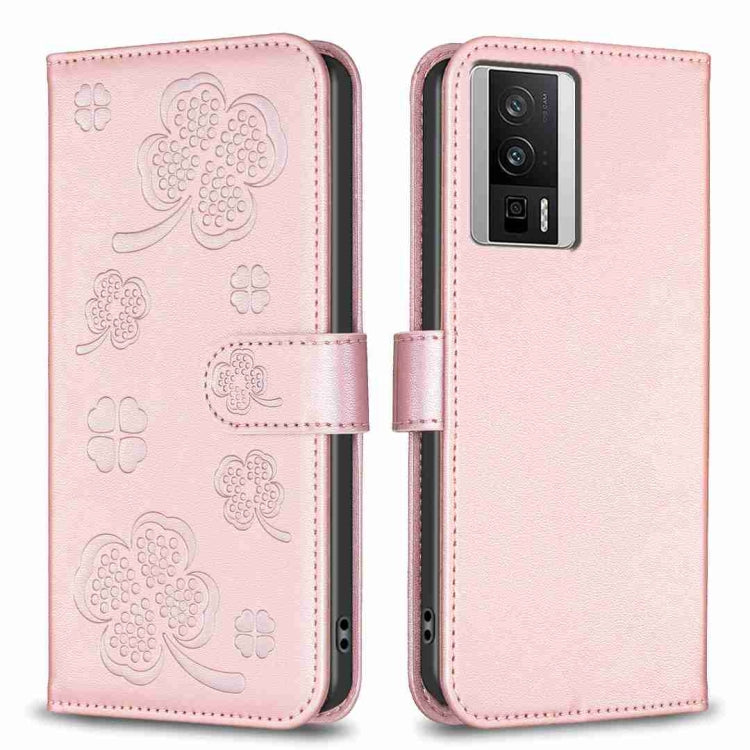 Pink four-leaf embossed leather phone case with flip cover and clover cutouts
