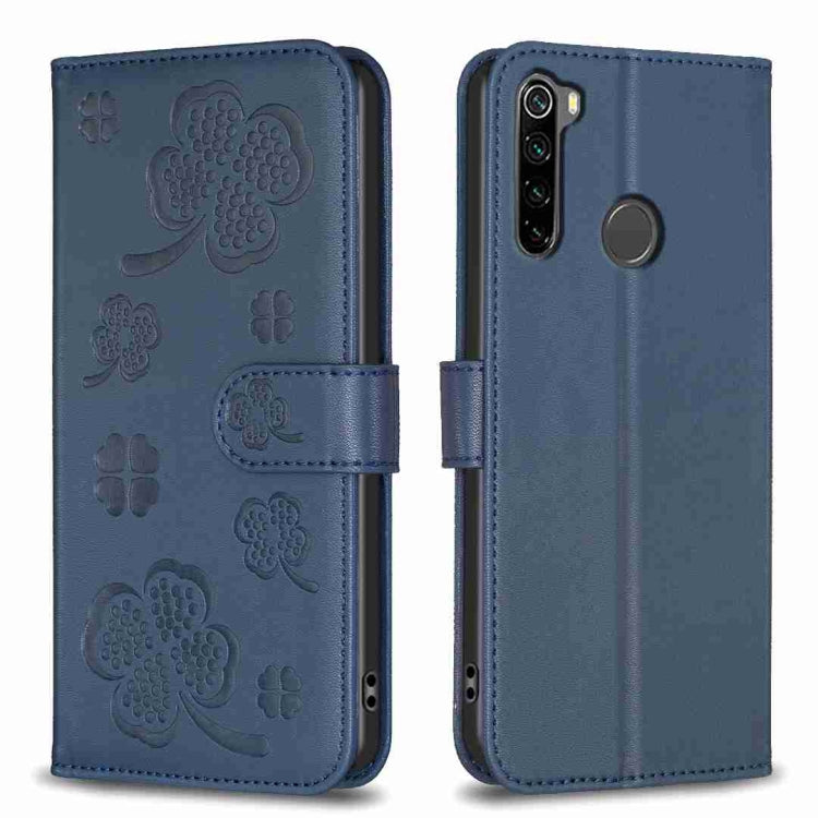 Blue embossed four-leaf clover leather phone case with fold-over strap and cutouts