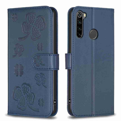 Blue embossed four-leaf clover leather phone case with fold-over strap and cutouts