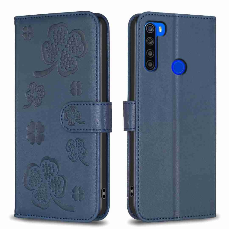 Four-leaf embossed leather phone case, blue folio with strap and clover emboss