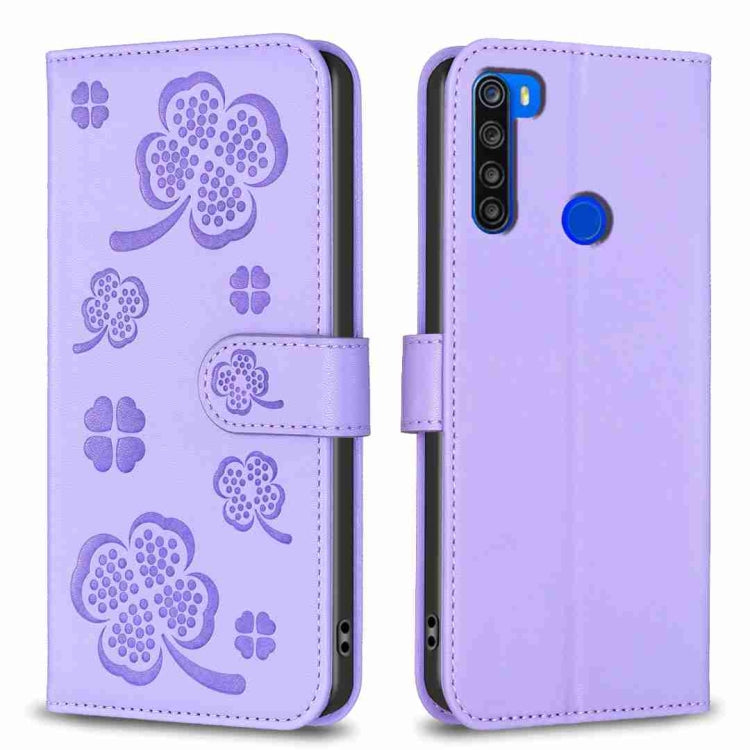Four-leaf embossed leather phone case, lavender folio with strap and blue camera accent