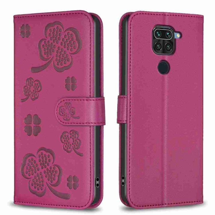 Purple embossed leather phone case with four-leaf clover pattern, flip cover and camera cutout