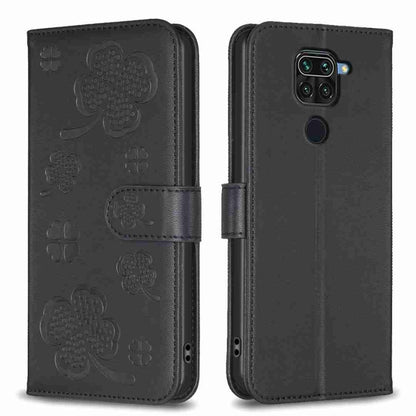 Black embossed leather phone case with four-leaf clover pattern, flip cover and camera cutout