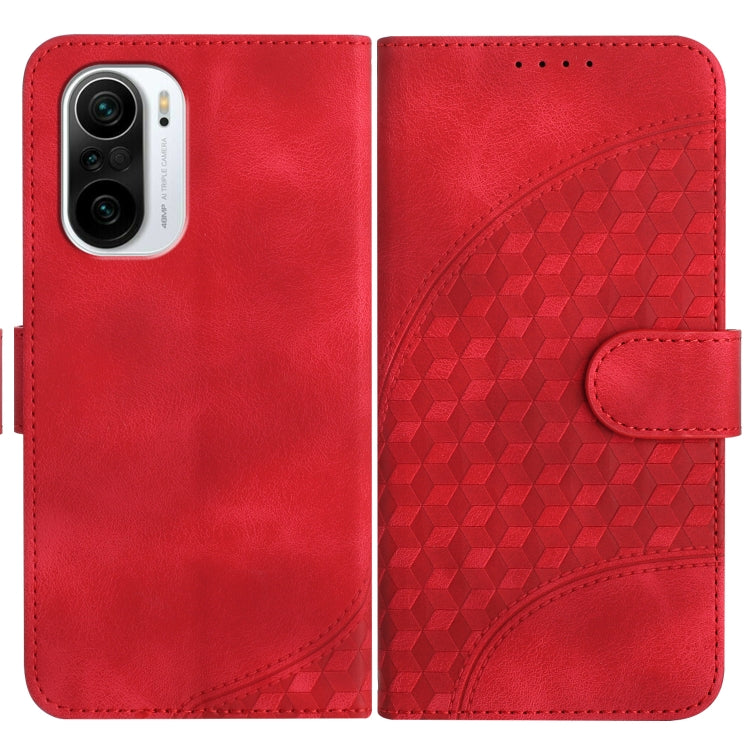Red leather wallet phone case with embossed geometric pattern and side strap