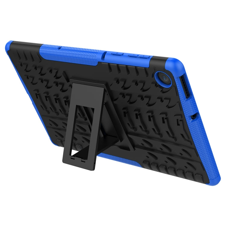Blue and black tablet case with textured back, rear camera opening, and kickstand